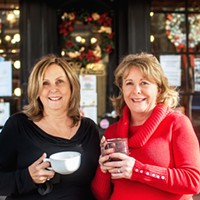 Owners Gail Mentink and Cathy Kunkler outside Old Town Coffee and Chocolates.