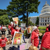 Fast-food workers and other SEIU members marched to the Capitol to deliver postcards and petitions in support of AB257 to the Governor's Office on May 31, 2022.