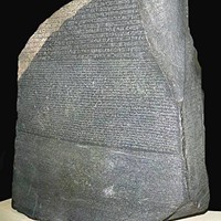 The 4-foot-tall Rosetta Stone. Fourteen lines of hieroglyphic text at the top, 32 lines of demotic ("shorthand hieroglyphic") text in the middle and 53 lines of Ancient Greek at the bottom.