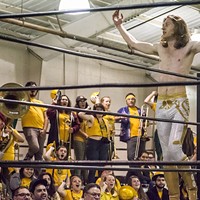 Brett Walters (aka Rocket Boy Brett) paused during his tag-team match to soak in support from his fellow HSU students and friends and The Marching Lumberjacks band.