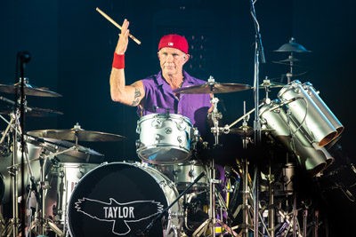 Chad Smith spins his drumstick between his fingers mid song. - PHOTO BY CHRIS TUITE FOR THE TWO RIVERS TRIBUNE