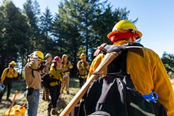 PHOTO COURTESY OF CAL POLY HUMBOLDT - Volunteer firefighters prepare to start work.
