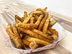 PHOTO BY JENNIFER FUMIKO CAHILL - Gyro Shop's extra-crispy, double-fried seasoned fries.
