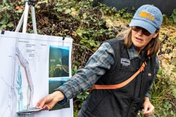 PHOTO BY MARK LARSON - Mary Burke, program manager for the North Coast Region of California Trout, pointed out project goals of creating 800 feet of a new channel for moving Prairie Creek away from U.S. Highway 101, restoring 18 acres of riparian and wetland floodplains and building a backwater pond to provide a slow-water refuge for juvenile salmon and steelhead.