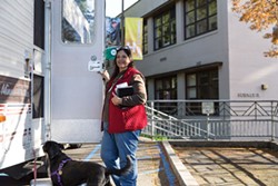 PHOTO BY SAM ARMANINO - After spending almost a year living out of her car in a McKinleyville parking lot, Dee Carfagna, a 61-year-old art student, used her financial aid money to purchase       an RV.