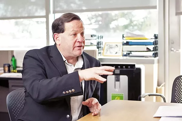 IN MEMORY SLO County 3rd District Supervisor Adam Hill passed away on Aug. 6. He was 54. Hill served for 12 years on the Board of Supervisors. This photo was taken during an interview with New Times in 2012. - FILE PHOTO BY STEVE E. MILLER