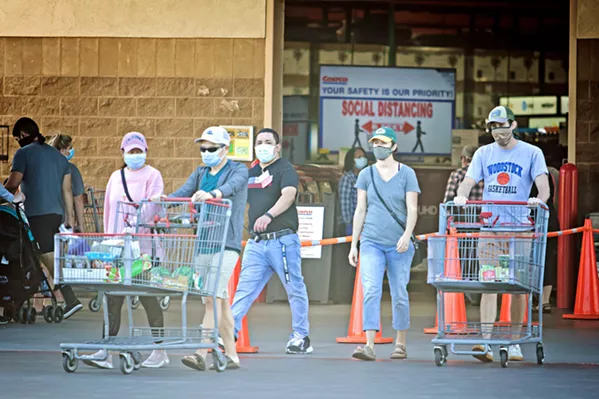 IN CHARGE Ordinances in SLO County mandate face coverings in grocery stores, but employees are left to enforce the rule. - FILE PHOTO BY JAYSON MELLOM