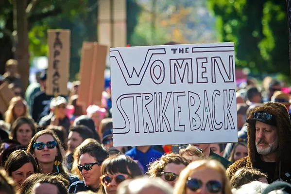 EQUAL RIGHTS Locals march in San Luis Obispo during the inaugural Women's March in 2017. - FILE PHOTO BY JAYSON MELLOM