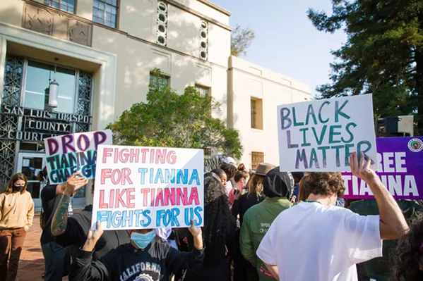 HEARINGS BEGIN Hundreds of supporters for Tianna Arata and Elias Bautista gathered in front of the San Luis Obispo Courthouse to listen to their cases' first virtual hearings. - PHOTO BY JAYSON MELLOM
