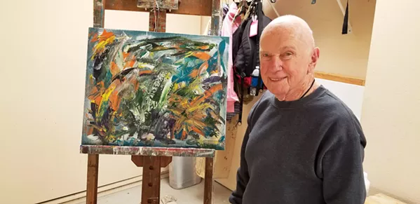 GOING STRONG AT 93 Morro Bay author and artist Marvin Sosna, whose work is at the Cambria Center for the Arts this month, stands before "Rising Tides," which he says "refers to Black Lives Matter, LGBTQ, the calls for justice and equality—a tsunami of long-restrained demand for action." - PHOTO COURTESY OF MARVIN SOSNA
