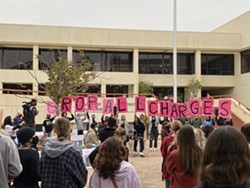'DROP ALL CHARGES' Hundreds gathered in front of the San Luis Obispo County Courthouse on Oct. 22 to support local activists Tianna Arata, Marcus Montgomery, Amman Asfaw, and Joshua Powell. - PHOTO BY KAREN GARCIA