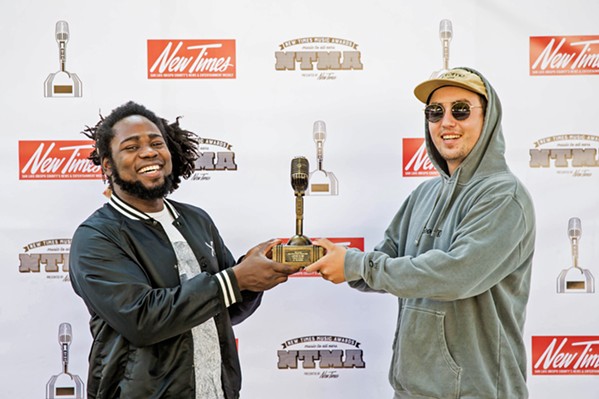 HIP-HOP/RAP Silk Ocean frontman Hakeem Sanusi (left) and producer Vince Angelo dropped "Listen to Me," a tight hip-hop track that would light up a dance floor. - PHOTO BY JAYSON MELLOM