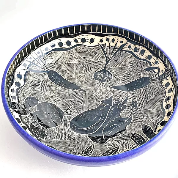 INTRICATELY HANDMADE A one-of-a-kind mug, bowl, or pair of earrings made by the loving hands of Patricia Griffin is a perfect present. - PHOTO COURTESY OF PATRICIA GRIFFIN CERAMICS FACEBOOK PAGE