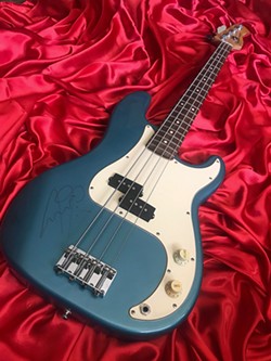GET IN IT TO WIN IT To raise funds, The Rock, Morro Bay and Paso's community radio station, will enter anyone who donates into a drawing to win this Fender bass signed by Sting! The drawing is on Dec. 31. - PHOTO COURTESY OF  97.3/107.9 THE ROCK COMMUNITY RADIO