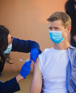 AMONG THE FIRST Dr. Trees Ritter, an infectious disease specialist with Dignity Health, was among the first Central Coast health care workers to receive a COVID-19 vaccine on Dec. 17. He said after, "I honestly didn't even feel it." - PHOTO BY JAYSON MELLOM