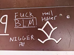 HATE SPEECH Local activist group says racist graffiti found on a play structure in Santa Margarita Community Park in December 2020, is evidence of racism within the community. - PHOTO COURTESY OF THE NAACP SLO COUNTY BRANCH