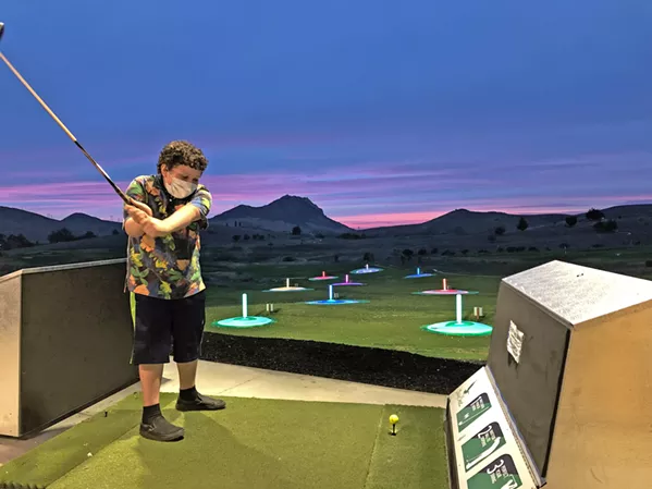 A GOOD TIME Toptracer® fun is open after dark, with a bowling-style golf-driving range, couches, and The Siren El Chorro's food and drink menu. - PHOTOS COURTESY OF STEPHANIE STILES