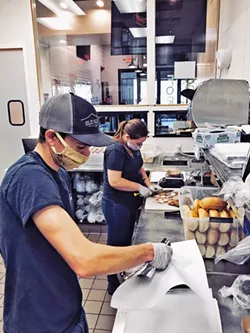 PANDEMIC PIVOTS Similar to all restaurants, Old SLO BBQ had to change things up after the pandemic arrived on the Central Coast, including masking up and offering to-go food only. - PHOTO COURTESY OF CATT HASBROOK