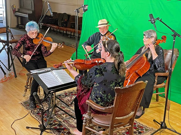 MAKING VIDEO MAGIC The Candlelight Strings&mdash;(clockwise from left) Bette Byers, Christopher Reutinger, Jeanne Shumway, and Mary Beth Rhodes-Woodruff&mdash;are shown recording videos of songs from Ragtime Musicale: Music For Silent Films, available on cdbaby.com. - PHOTO BY GLEN STARKEY