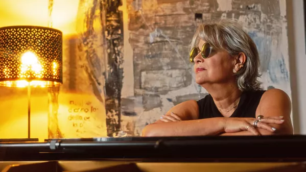 SILVER LININGS Trapped at home by the pandemic, pianist and composer Lee Ann Vermeulen-Roberts started playing open air concerts for her neighbors, resulting in the improvised instrumental album Grand Piano Vibes vol. 1, being released on April 23. - PHOTO COURTESY OF LEE ANN VERMEULEN-ROBERTS
