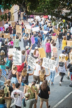 DEFUND Cal Poly SQE is one of several groups in SLO County pushing for divestment from policing. - FILE PHOTO BY JAYSON MELLOM