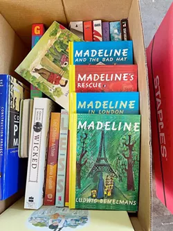 BOOKS GALORE The Monday Club received 1,000 book donations on May 10 as part of its new Equity and Access to Literacy program. These books will be delivered to local students via the Food Bank. - PHOTO COURTESY OF JANICE CROOKS