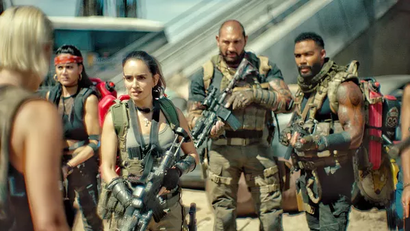 ZOMBIE FOOD A team of mercenaries infiltrates a walled-off Las Vegas infested with zombies in a bid to steal $200 million from a casino's underground vault, in Army of the Dead, screening on Netflix. - PHOTO COURTESY OF NETFLIX