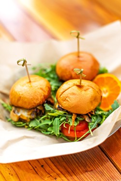 FLAVOR BOMBS Lobo's sliders contain chorizo and beef patties served with grilled onions, tomatoes, arugula, and Beerwood aioli on a brioche bun. - COURTESY PHOTOS BY CADY CONNELLY