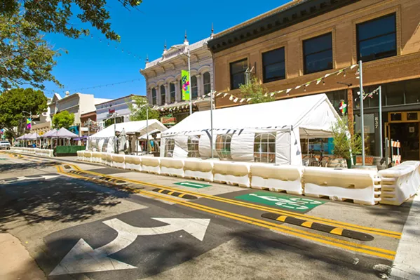 PARK IT AT A PARKLET As part of its pandemic response, SLO made the last stretch of Monterey Street going into Mission Plaza a one-way street, making room for street dining outside Giuseppe's and Finney's. - PHOTO BY JAYSON MELLOM