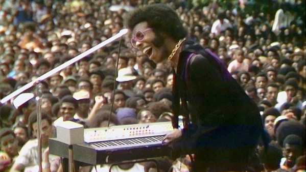'TAKE YOU HIGHER' Sly Stone entertains a huge crowd during the Harlem Cultural Festival, which took place over six weekends in 1969, in the new documentary Summer of Soul, screening at The Palm Theatre and on Hulu. - PHOTO COURTESY OF CONCORDIA STUDIO AND SEARCHLIGHT PICTURES