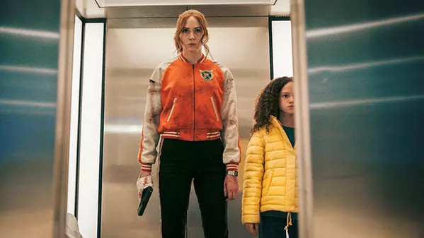 KILLER ELITE Female assassin Sam (Karen Gillan, left) has to retrieve kidnaped Emily (Chloe Coleman), in the female-centric shoot-'em-up Gunpowder Milkshake on Netflix. - PHOTO COURTESY OF STUDIOCANAL AND THE PICTURE COMPANY