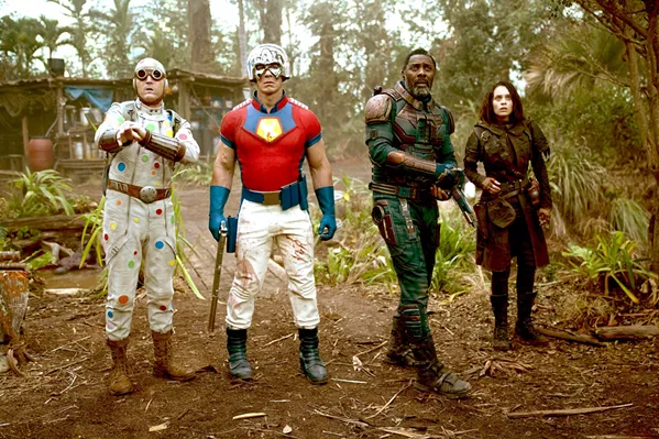 SUICIDAL A team of criminals—including (left to right) Polka Dot Man (David Dastmalchian), Peacemaker (John Cena), Bloodsport (Idris Elba), and Ratcatcher 2 (Daniela Melchior)—are recruited for an impossible mission, in The Suicide Squad. - PHOTO COURTESY OF ATLAS ENTERTAINMENT AND DC COMICS