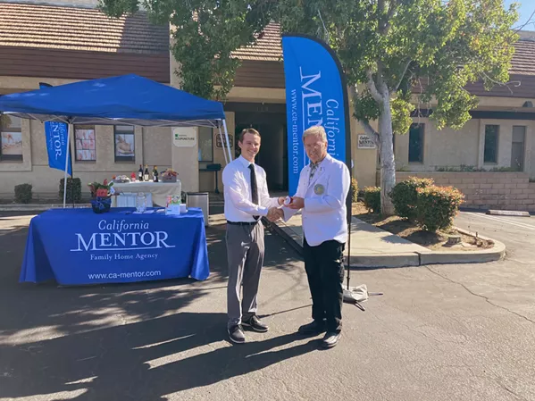 A NEW HOME California MENTOR Family Home Agency's ribbon cutting ceremony with Program Director Wesley Marking (left) and Santa Maria Chamber of Commerce Ambassador Paul Klock (right), marks the grand opening of the Santa Maria Office. - PHOTO COURTESY OF CAITY MCCARDELL