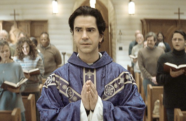DELIVERS US TO EVIL When new priest Father Paul (Hamish Linklater) arrives on an isolated fishing island to replace the previous Catholic priest, the islanders are astounded by what appear to be miracles, but all is not as it seems, in Midnight Mass, a seven-part supernatural horror mini-series screening on Netflix. - PHOTO COURTESY OF INTREPID PICTURES AND NETFLIX STUDIOS