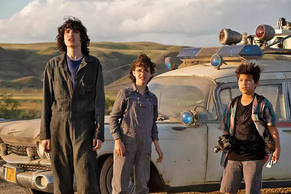 NEXT GENERATION Trevor (Finn Wolfhard), Phoebe (Mckenna Grace), and Podcast (Logan Kim) team up to stop another ghost infestation, in Ghostbusters: Afterlife, an effective reboot of the franchise. - PHOTO COURTESY OF COLUMBIA PICTURES
