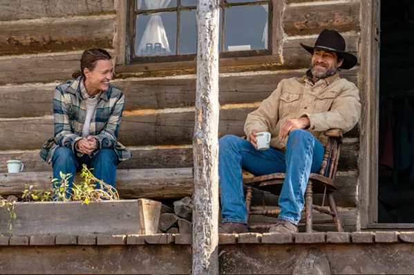 LEARNING TO LAUGH AGAIN After a personal tragedy, Edee (Robin Wright, who also directs), no longer able to stand being around others, decides to live off the grid in a remote cabin, but after winter hits and she almost dies, through the help of Miguel (Demián Birchir), she discovers life goes on, in Land, on HBO Max. - PHOTO COURTESY OF BIG BEACH FILMS