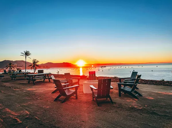 SUN AND SANDS Flying Flags Avila Beach’s visitors can enjoy coastal views around a propane fire pit right outside their cottages. - PHOTO COURTESY OF FLYING FLAGS AVILA BEACH’S FACEBOOK PAGE