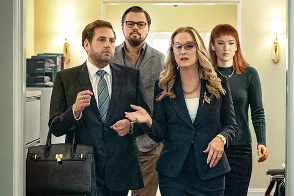 BLITHE SPIRITS U.S. President Janie Orleans (Meryl Streep) and her chief of staff son, Jason (Jonah Hill), brush off Dr. Randall Mindy (Leonrdo DiCaprio) and scientist Kate Dibiasky's (Jennifer Lawrence) warning of a planet-ending meteor strike, in Don't Look Up, a satire by writer-director Adam McKay. - PHOTO COURTESY OF HYPEROBJECTS INDUSTRIES AND BLUEGRASS FILMS