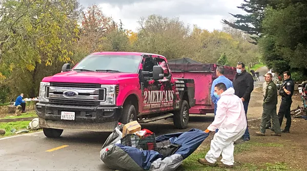 CLEARING OUT A garbage clearing company called 2Mexicans Junk Removal swept the Bob Jones Trail area for items belonging to the homeless that were considered trash. - PHOTO BY BULBUL RAJAGOPAL