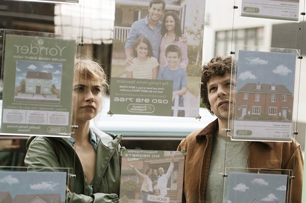 STARTER HOME Young couple Gemma (Imogen Poots) and Tom (Jesse Eisenberg) have decided to settle down, but when they visit Yonder, a new tract housing complex, they suddenly find themselves trapped in a suburban nightmare, in Vivarium, screening on Amazon Prime. - PHOTO COURTESY OF LOVELY PRODUCTIONS