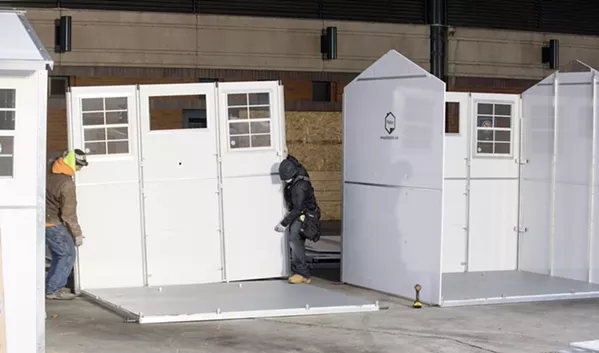 SIMPLE SET-UP Pallet shelters are easy and quick to assemble, setting them apart from other shelter solutions. - PHOTO COURTESY OF MULTNOMAH COUNTY