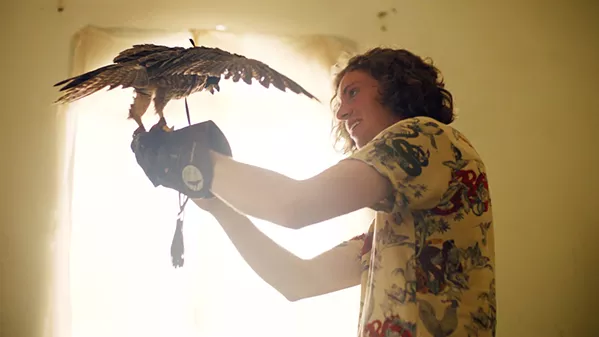 DIVIDED Well-off foreigner Cai (Rupert Fennessy) works with his poor best friend at an Oman zoo and struggles to choose between his love of animals and his loyalty to his friend, in The Falconer, screening as part of the SLOIFF. - PHOTO COURTESY OF REQUIRED READING