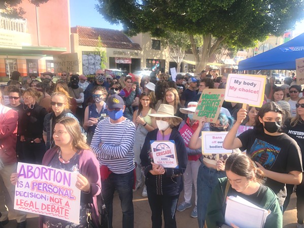 OUTCRY Hundreds of San Luis Obispo residents gathered in front of the Superior Court to rally for reproductive rights on May 3. - PHOTO BY BULBUL RAJAGOPAL