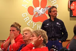 BAD NEWS : Atascadero City Councilman Brian Sturtevant arrived just in time for the bad news to start rolling in for the Mitt Romney campaign. - PHOTO BY COLIN RIGLEY