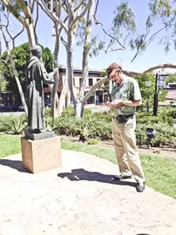 FATHER TIME: Joe Morris discusses the influence of Father Junipero Serra on Mission life in the 18th century. - PHOTO BY JESSICA PENA