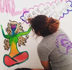 IT’S A PROCESS: Venegas works on an acrylic painting titled "Colors Within." - PHOTO COURTESY OF VANESSA VENEGAS