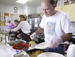 GOOD AND PLENTY :  From right to left, volunteers Mike Draze , Dianne Draze (married to Mike), Dorothy McCoie and Beth Peterson serve clients at the Prado Day Center. - PHOTO BY STEVE E. MILLER