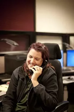 MISDIAL : Dispatchers are accustomed to accidental cell-phone calls—what they like to call butt-dials—and they sometimes hear chatter on the other end, like when Holly Porter heard someone say, ‘Dude, where’d that bong go?’ - PHOTO BY STEVE E. MILLER