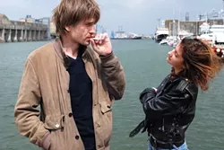 ENIGMATICALLY FRENCH : Provincial 16-year-old Iris (Lola Créton, right) and 40-year-old Parisian photographer Jean (Stanislas Merhar) develop an amorous relationship in Iris in Bloom. - PHOTO COURTESY OF FILMS BOUTIQUE
