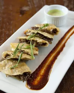 SEE RED : Dishes like duck confit quesadilla, local citrus with honey cile syrup, and global ceviches are certain to make your mouth water. - PHOTOS BY STEVE E. MILLER
